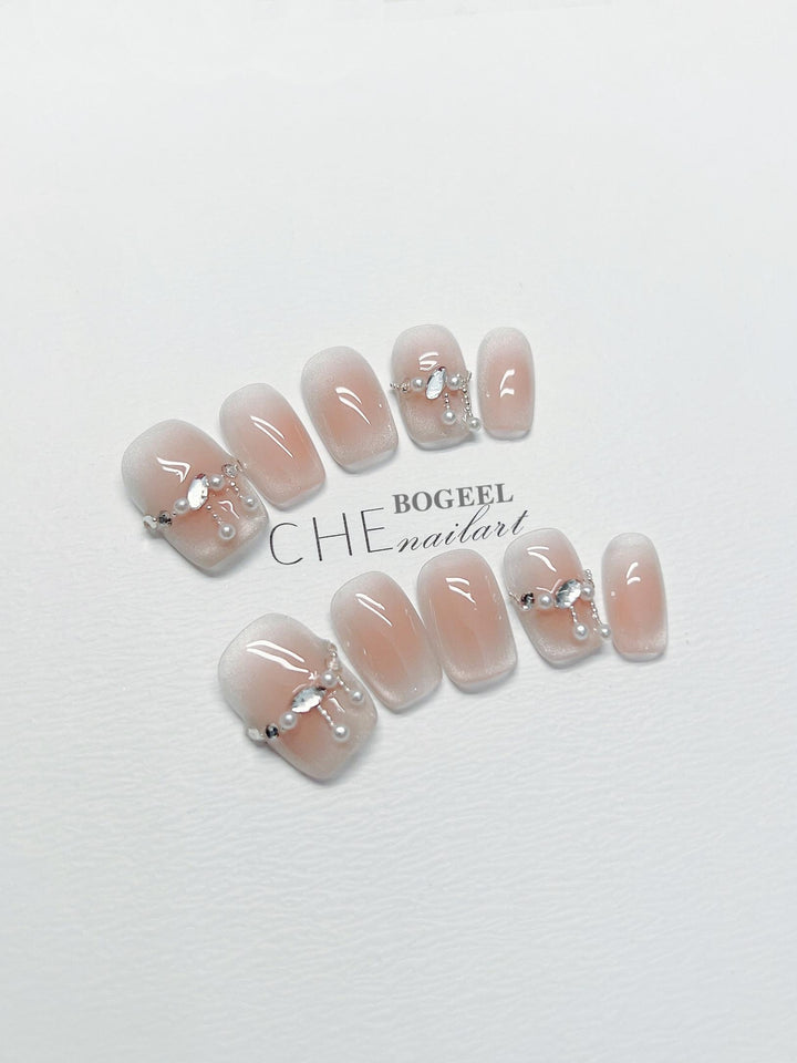 Hand-worn Nail Blush Smudges Rhinestone Short